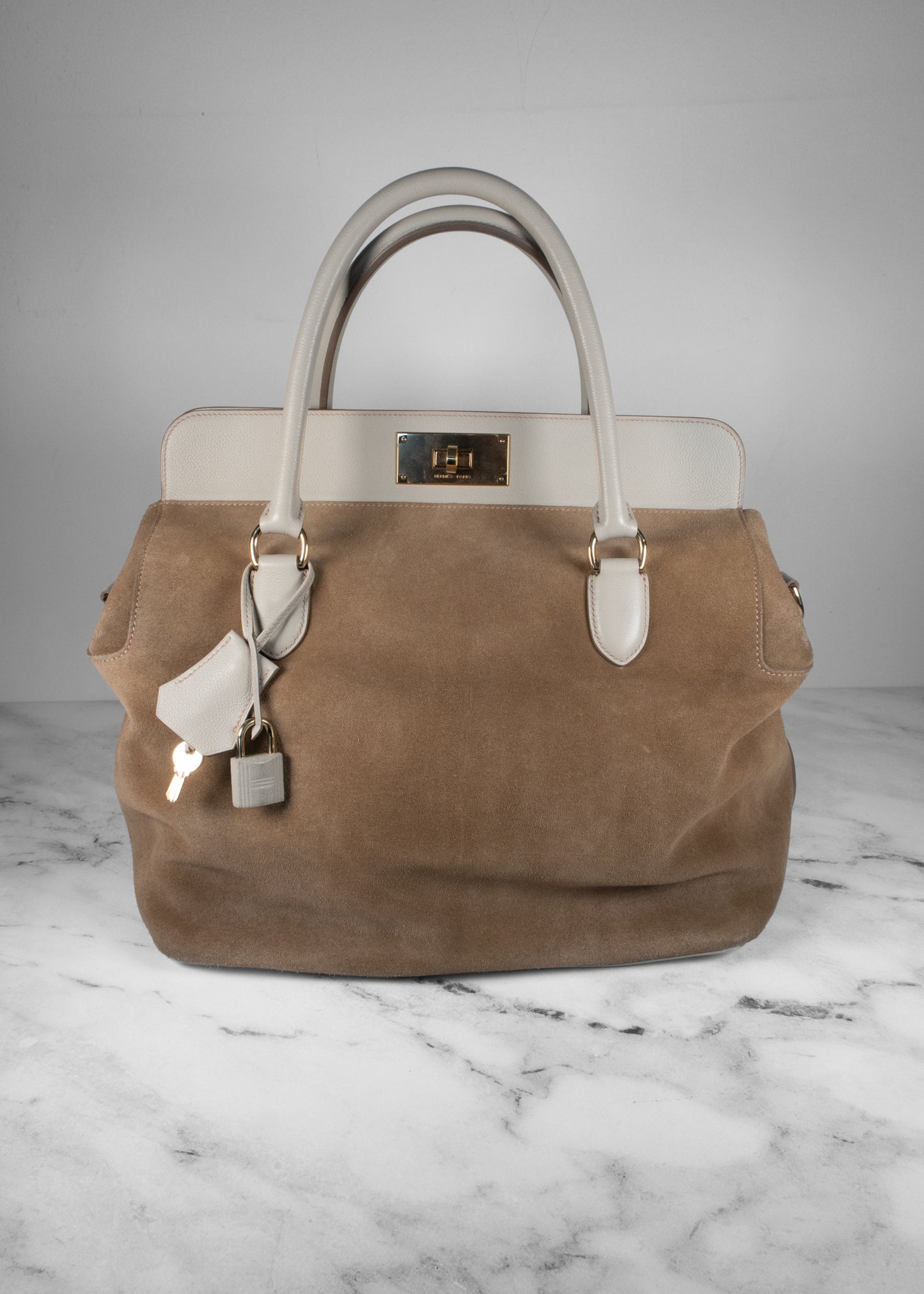 Hermès Toolbox Bag in Veau Grizzly and Evercolor Leather