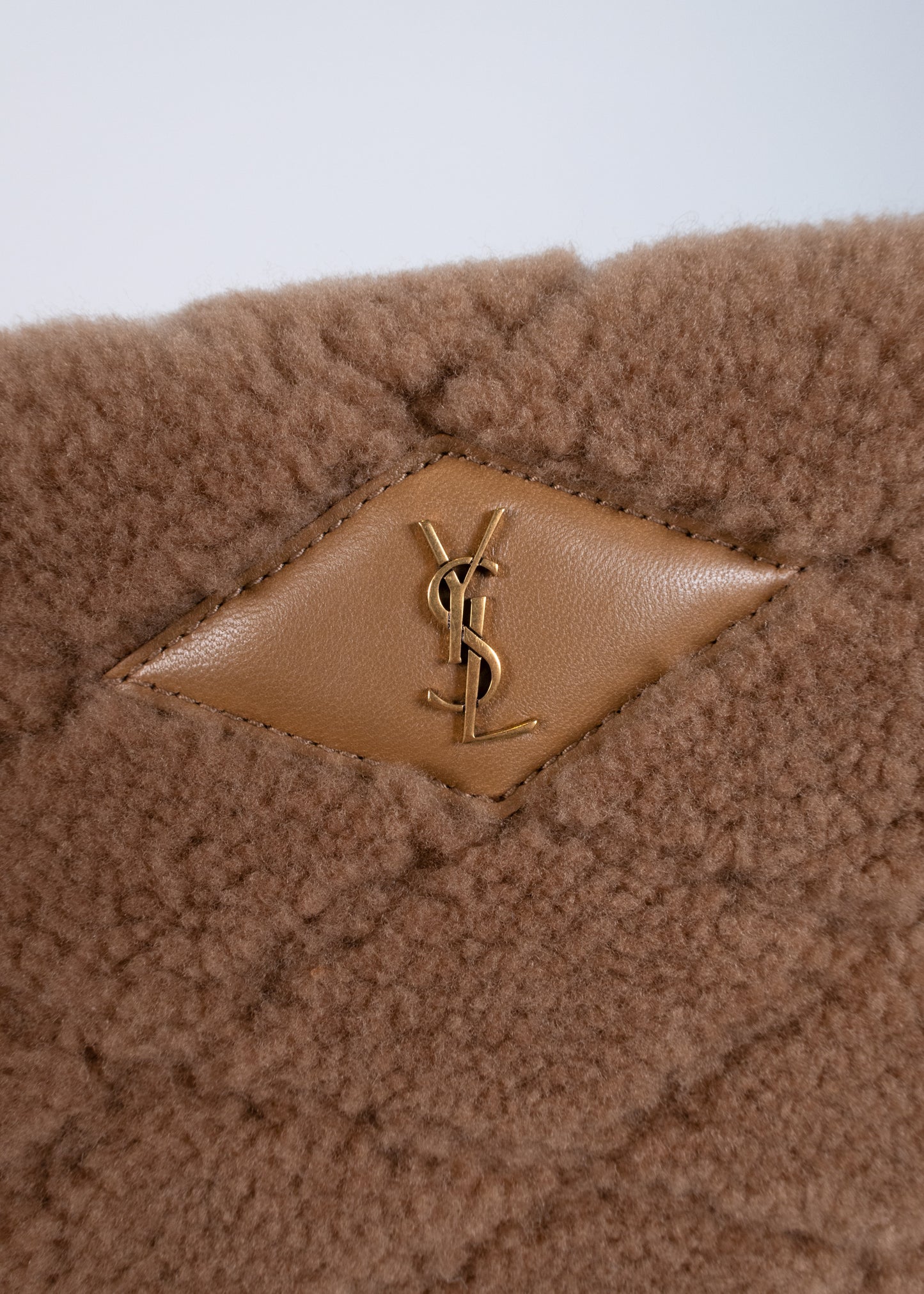 Saint Laurent Sade Large Quilted Shearling Clutch