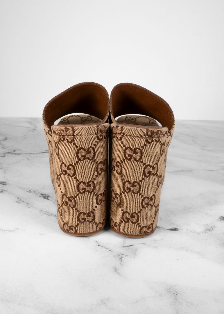 Gucci Brown Monogram Platform Slides With Horsebit Detail