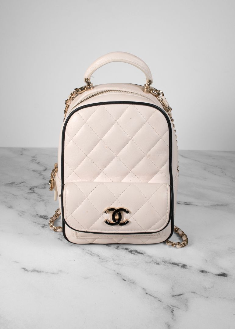 Chanel White Quilted Leather Mini Backpack With Gold Chains And Top Handle