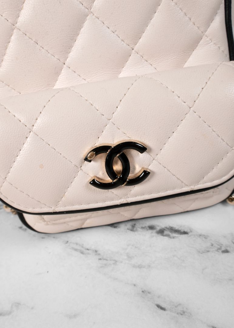 Chanel White Quilted Leather Mini Backpack With Gold Chains And Top Handle