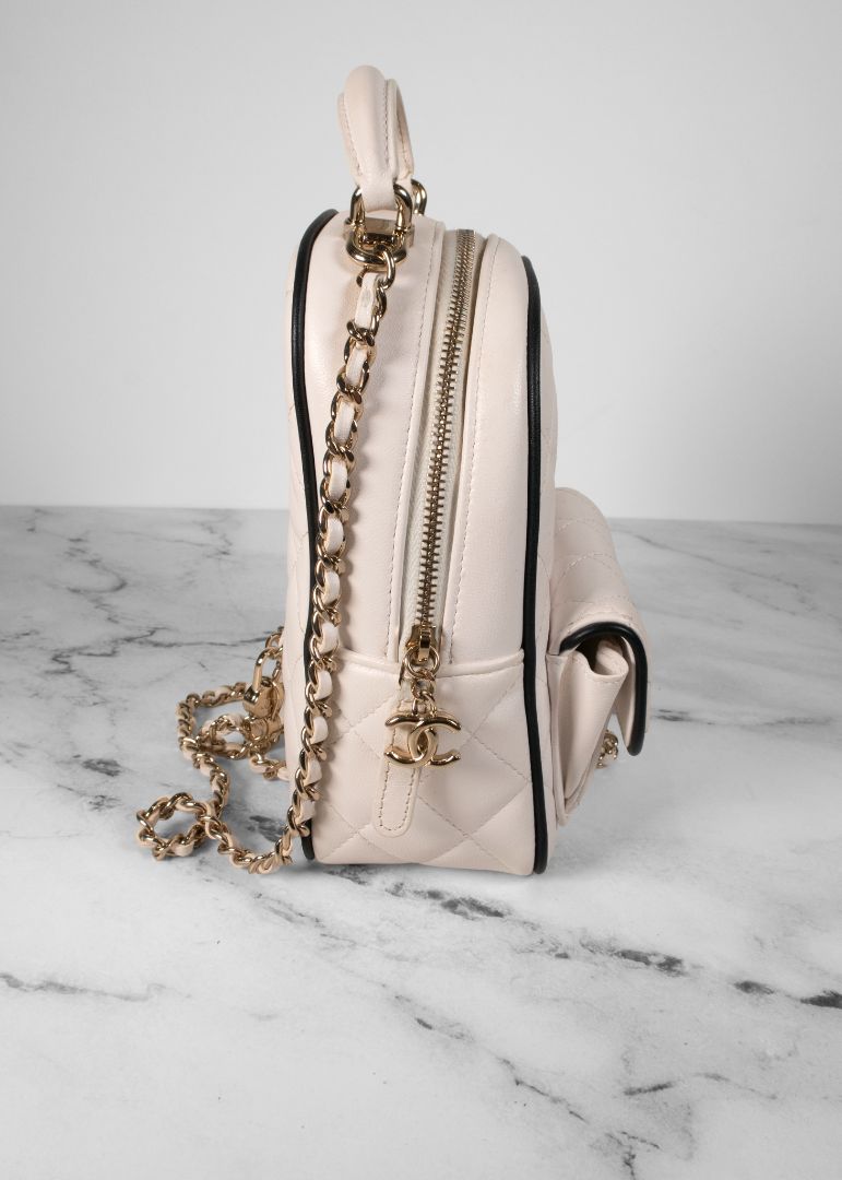 Chanel White Quilted Leather Mini Backpack With Gold Chains And Top Handle