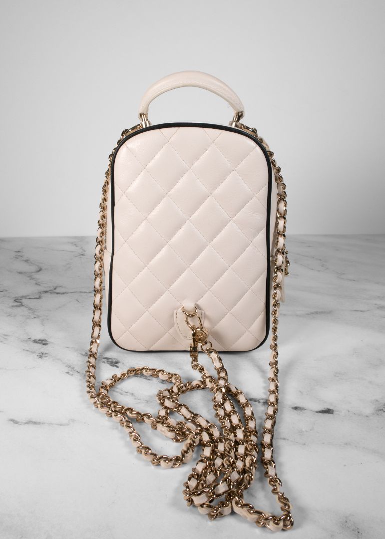 Chanel White Quilted Leather Mini Backpack With Gold Chains And Top Handle