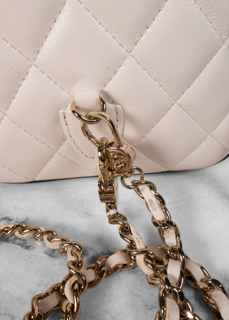 Chanel White Quilted Leather Mini Backpack With Gold Chains And Top Handle