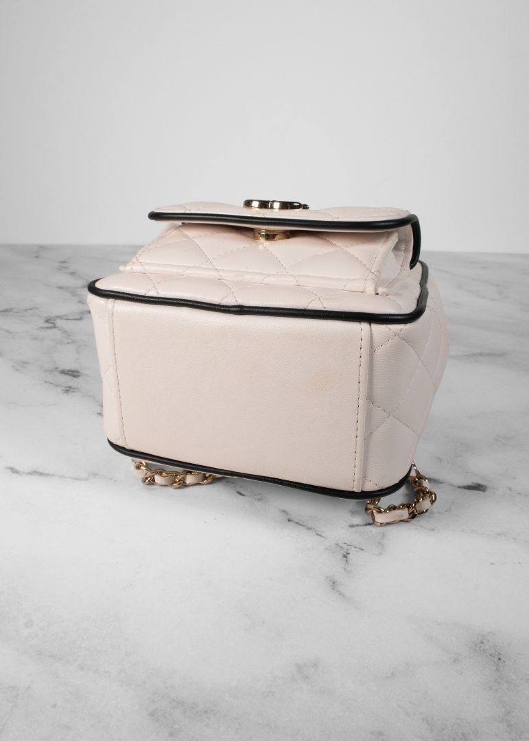 Chanel White Quilted Leather Mini Backpack With Gold Chains And Top Handle