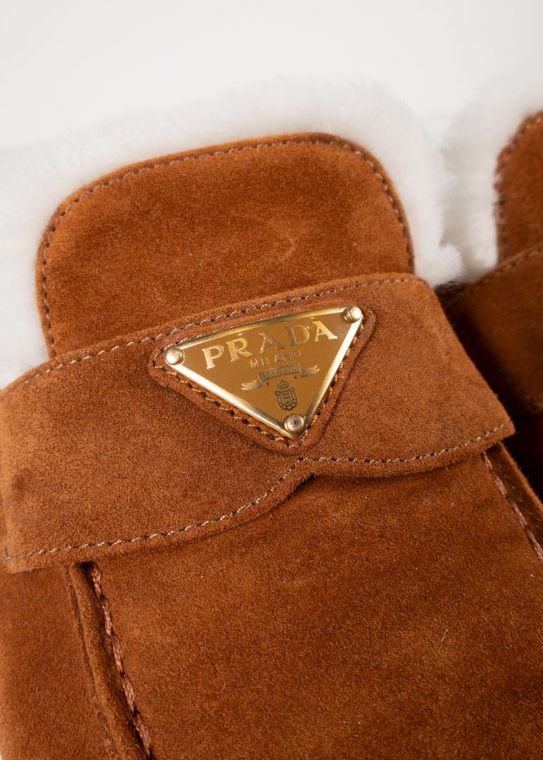 Prada Brown Suede Shearling Mules With Gold Hardware