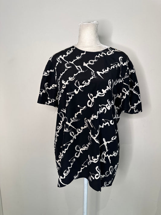 Chanel black and white logo silk blouse with gold buttons on right shoulder
