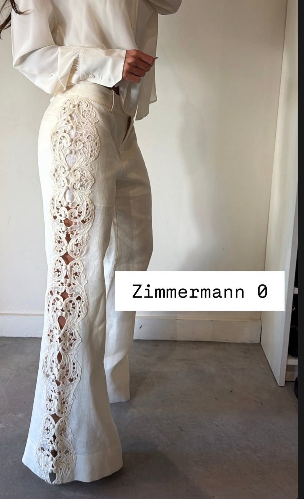 Zimmermann Ivory Flare Pants With Eyelet Details On The Sides Size 0