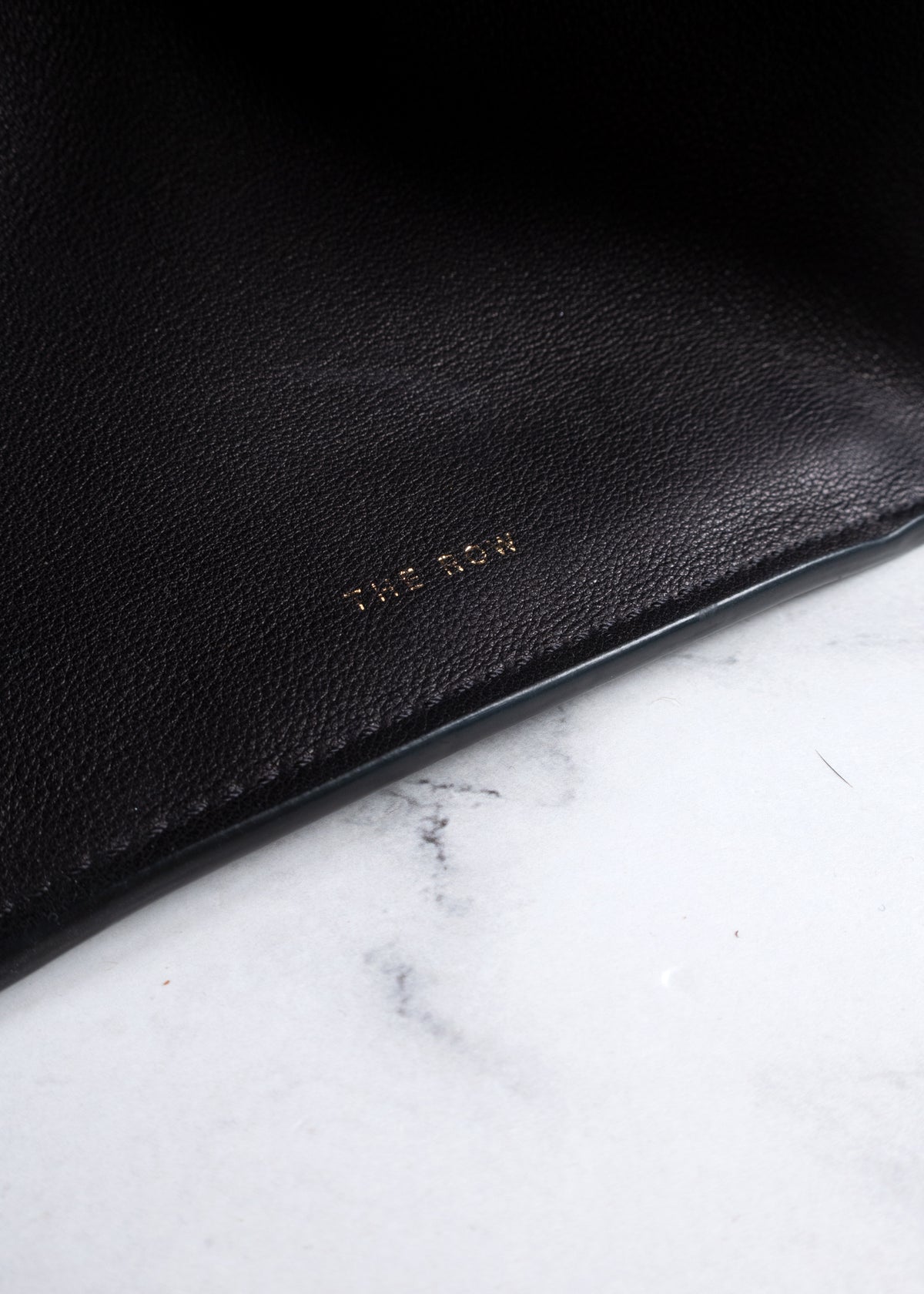 The Row Black Leather Soft Margaux 12 Bag With Gold Hardware