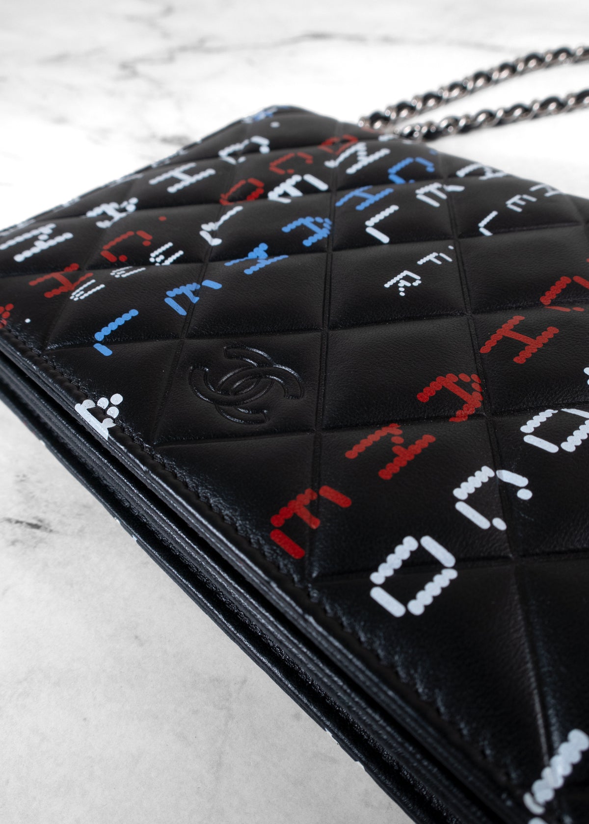 Chanel Digital Typography Printed Lambskin Wallet on Chain bag