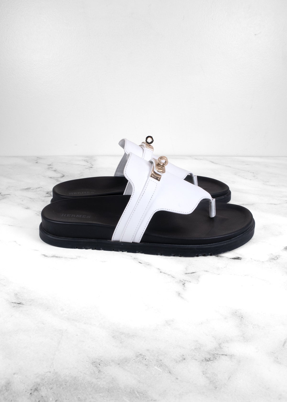 Hermès Empire White Calfskin Kelly Buckle Thong Sandals