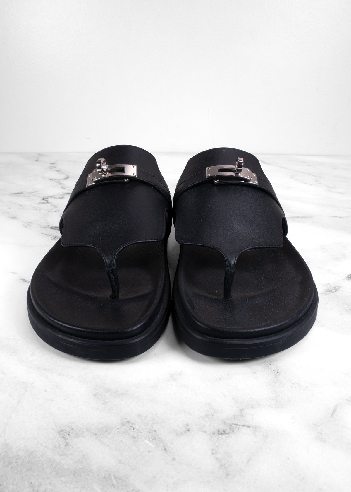 Hermès Empire Noir Calfskin Palladium Kelly Buckle Thong Sandals