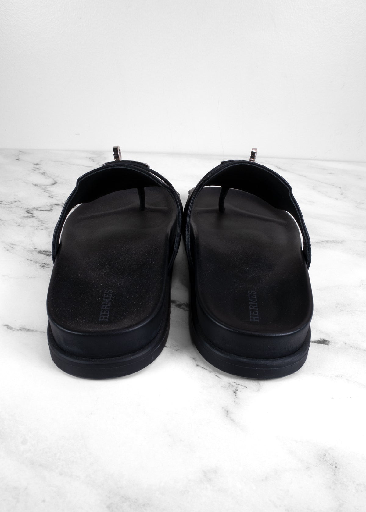 Hermès Empire Noir Calfskin Palladium Kelly Buckle Thong Sandals