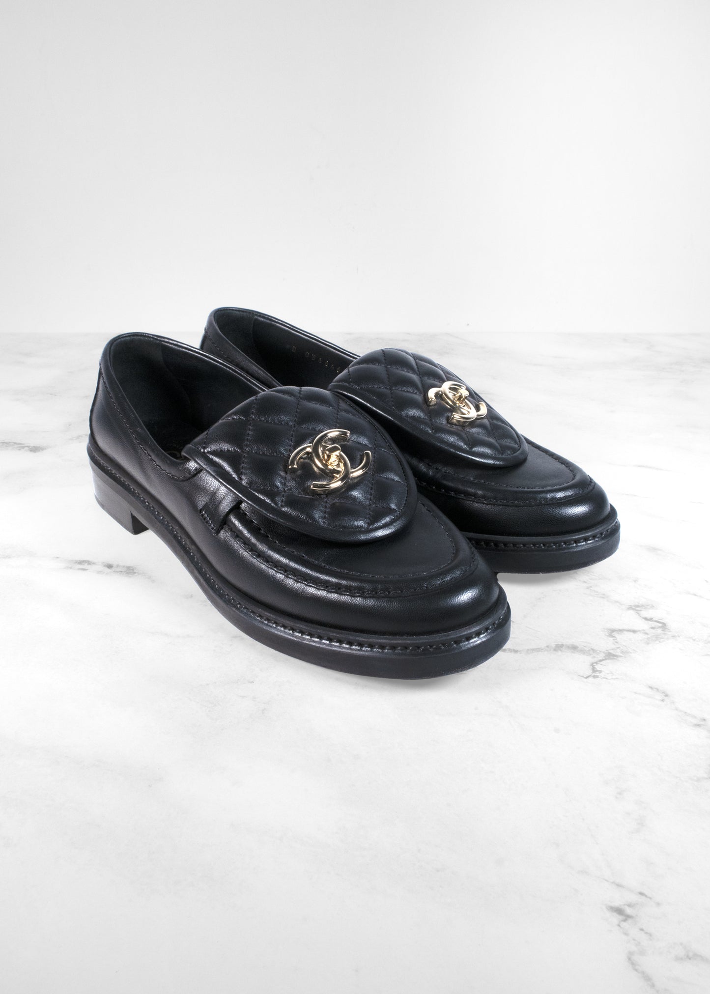 Chanel Black Quilted Leather CC Turnlock Loafers