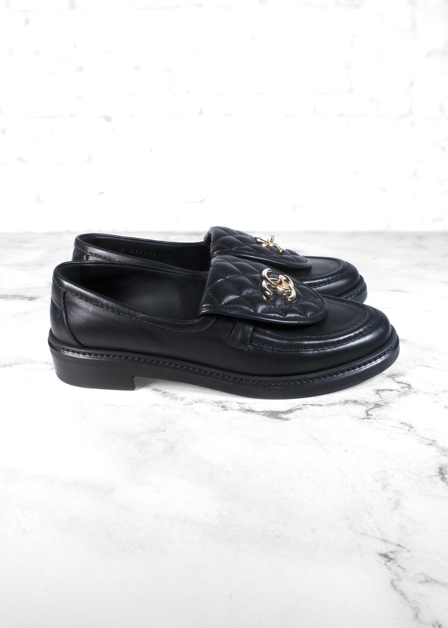 Chanel Black Quilted Leather CC Turnlock Loafers