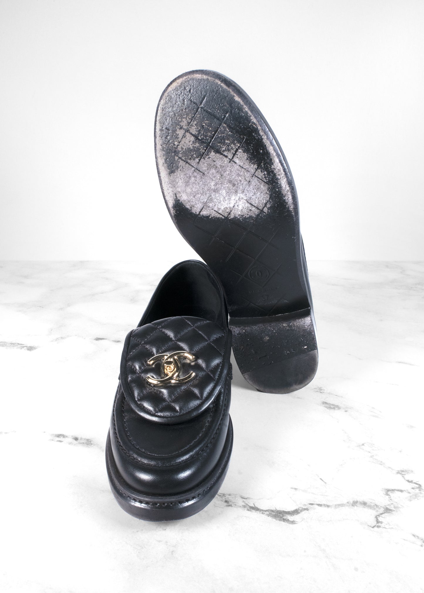 Chanel Black Quilted Leather CC Turnlock Loafers