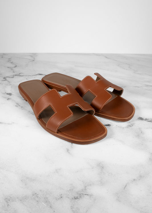 Hermes Flat Oran Gold Sandals