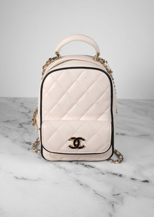 Chanel White Quilted Leather Mini Backpack With Gold Chains And Top Handle