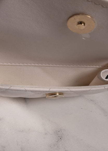 Chanel White Quilted Leather Mini Backpack With Gold Chains And Top Handle