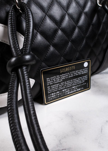 Chanel Black Calfskin Quilted Cambon Bowler Bag With White CC