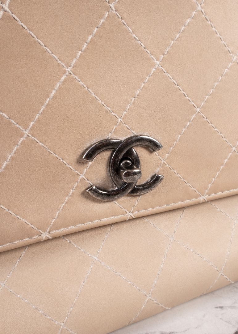 Chanel Beige Quilted Leather Flap Bag With Top Handle And Silver Chain Link Strap