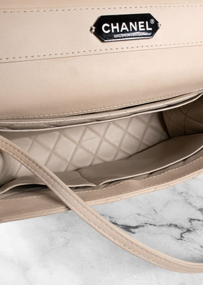 Chanel Beige Quilted Leather Flap Bag With Top Handle And Silver Chain Link Strap