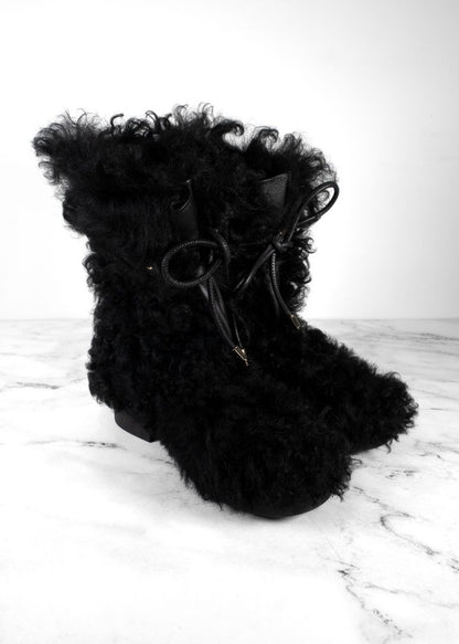 Chanel Black Shearling Boots With Leather Strap And Gold CC Hardware