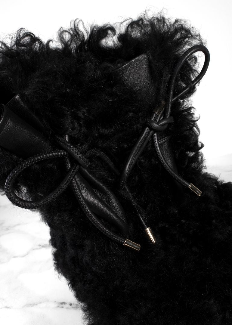 Chanel Black Shearling Boots With Leather Strap And Gold CC Hardware