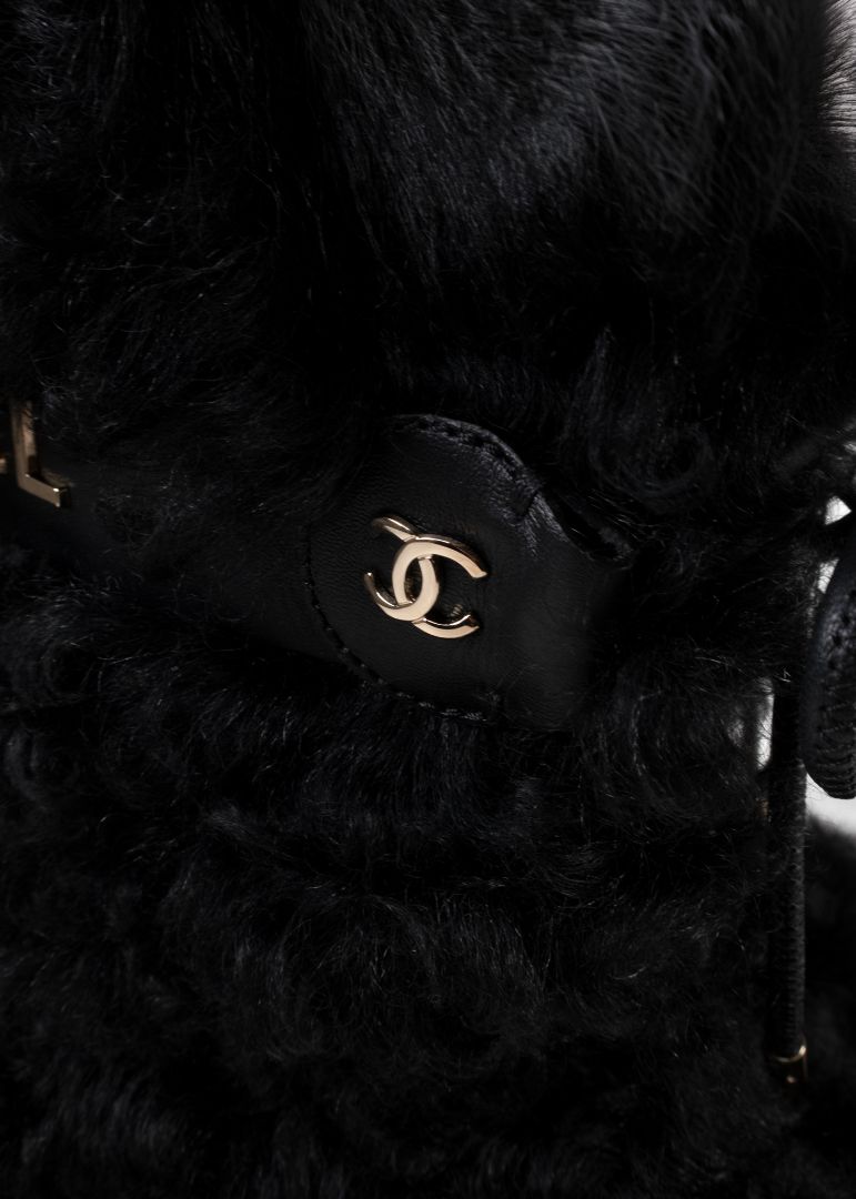 Chanel Black Shearling Boots With Leather Strap And Gold CC Hardware