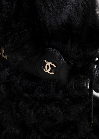 Chanel Black Shearling Boots With Leather Strap And Gold CC Hardware