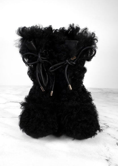 Chanel Black Shearling Boots With Leather Strap And Gold CC Hardware