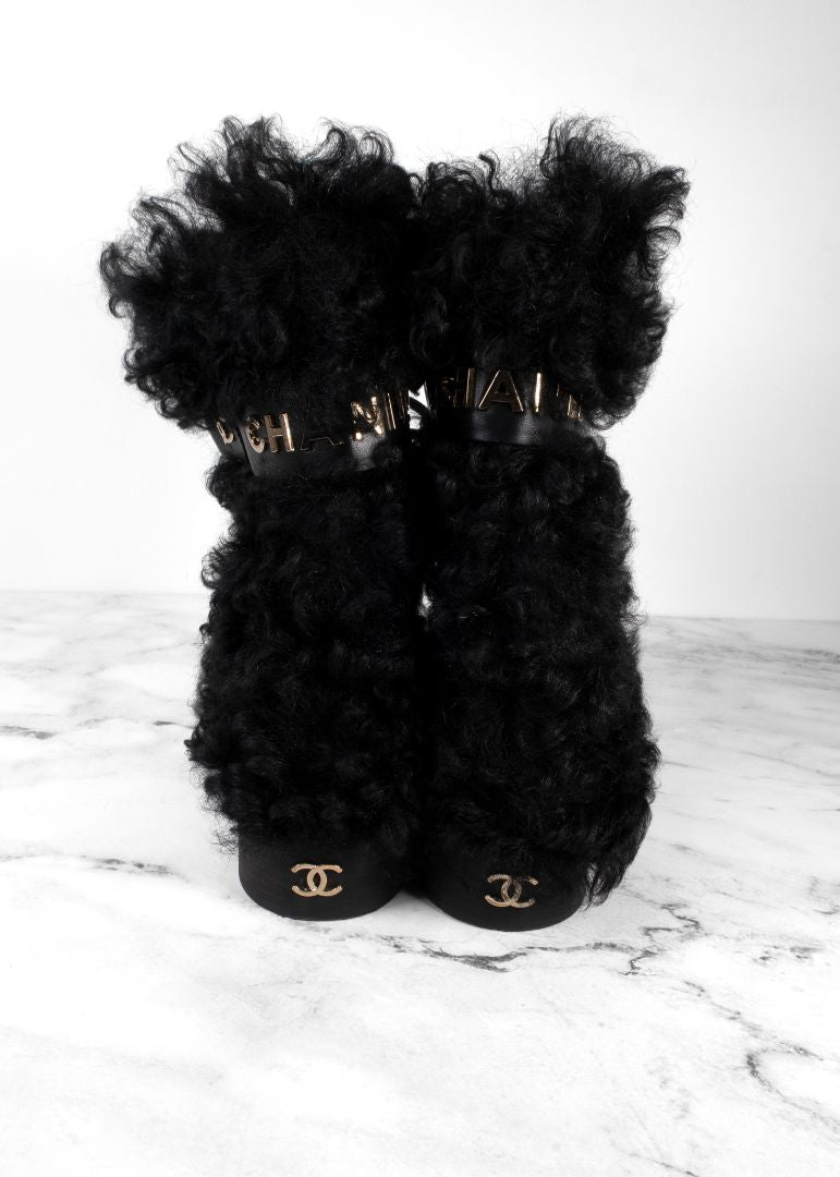 Chanel Black Shearling Boots With Leather Strap And Gold CC Hardware