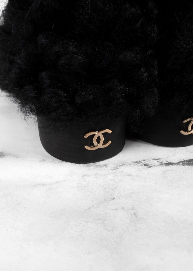Chanel Black Shearling Boots With Leather Strap And Gold CC Hardware