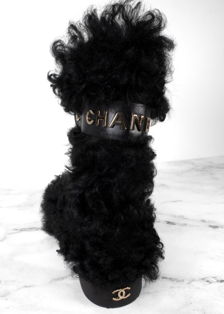 Chanel Black Shearling Boots With Leather Strap And Gold CC Hardware