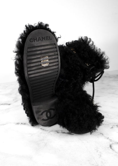 Chanel Black Shearling Boots With Leather Strap And Gold CC Hardware