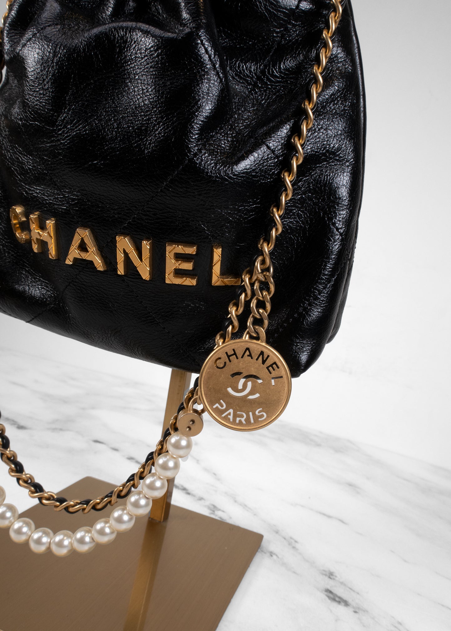 Chanel Shiny Crumpled Calfskin Quilted Pearl Mini Chanel 22 Black