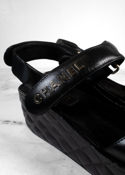 Chanel Black Shiny Calfskin Quilted Logo Platform Wedge Sandals