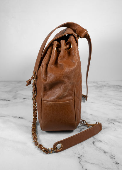 Chanel Vintage Quilted Caviar Leather Circle Turnlock Backpack