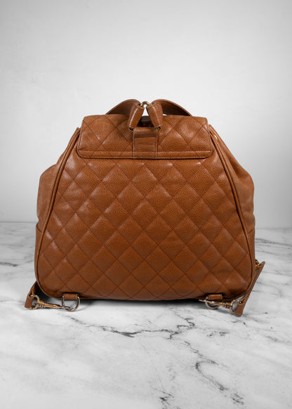 Chanel Vintage Quilted Caviar Leather Circle Turnlock Backpack
