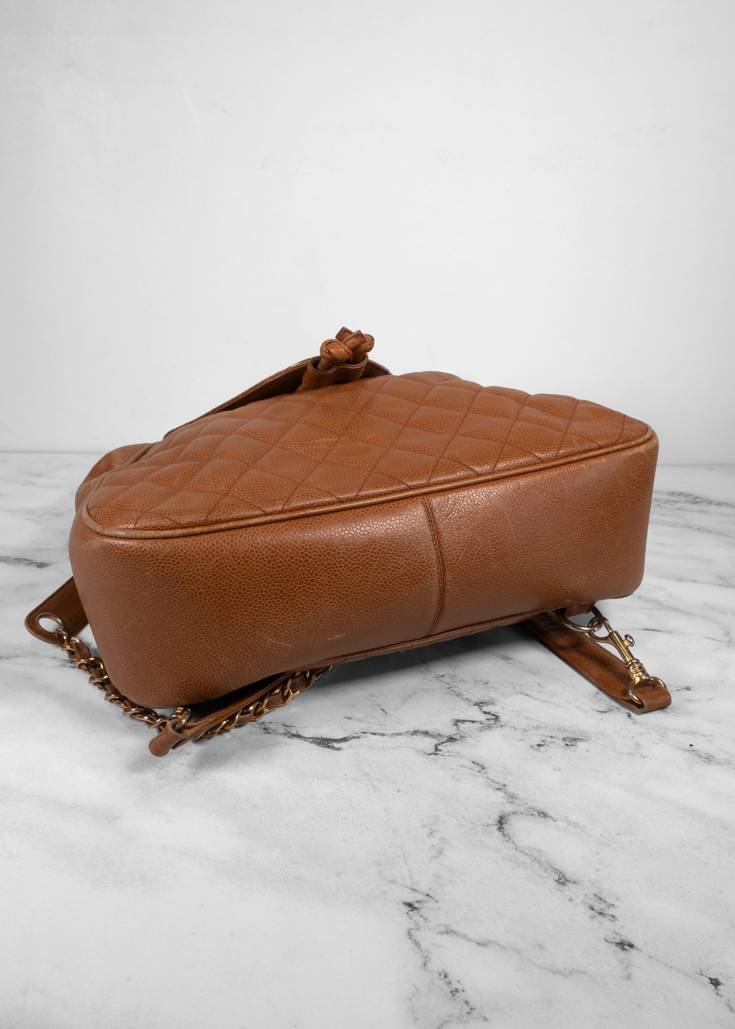 Chanel Vintage Quilted Caviar Leather Circle Turnlock Backpack