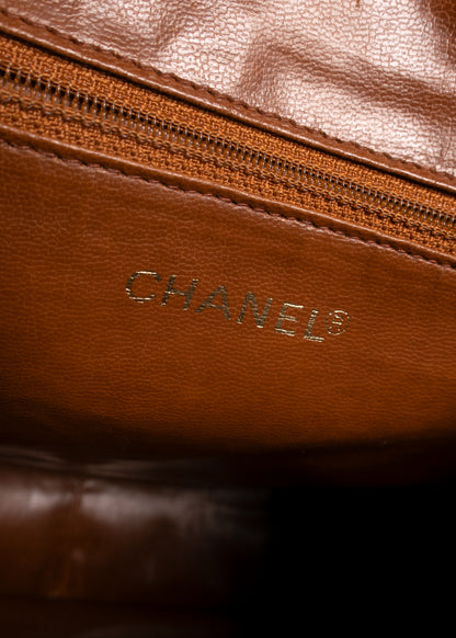 Chanel Vintage Quilted Caviar Leather Circle Turnlock Backpack